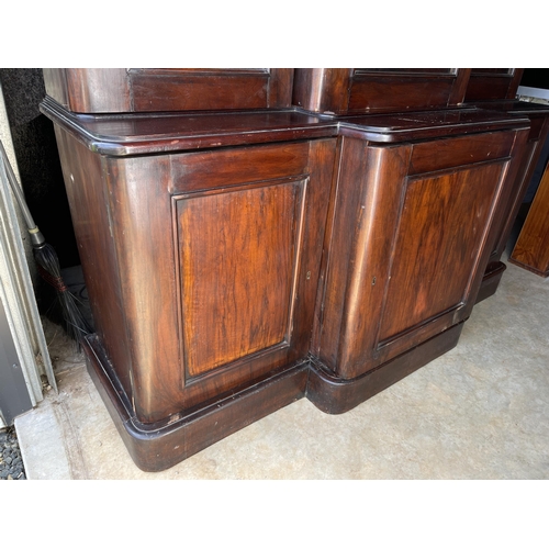 822 - Antique late Victorian mahogany break front three door two height bookcase, approx 236cm H at center... 