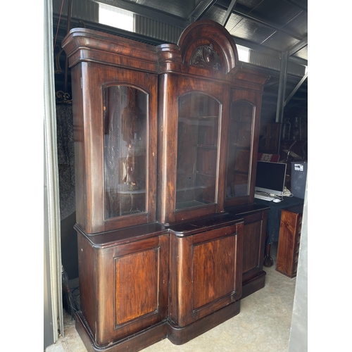 822 - Antique late Victorian mahogany break front three door two height bookcase, approx 236cm H at center... 