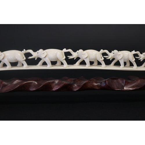 3 - Chinese carved ivory tusk section of eight graduating elephant train, on wooden base, approx 8cm H x... 