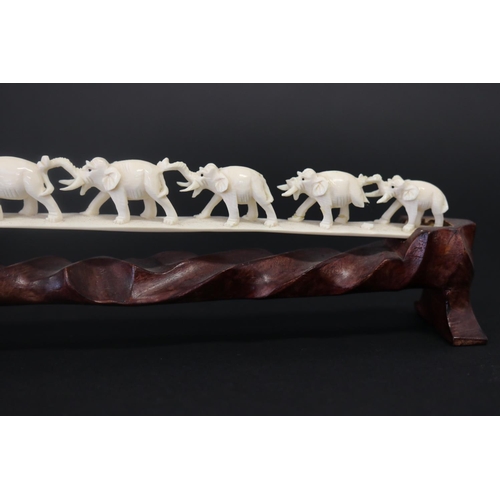 3 - Chinese carved ivory tusk section of eight graduating elephant train, on wooden base, approx 8cm H x... 