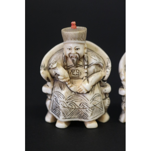 4 - Two carved ivory figures of Emperor & Empress, both signed, each approx 5.5cm H (2)