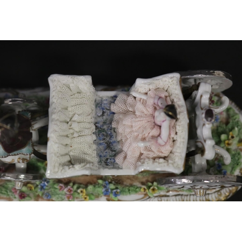 25 - Continental porcelain carriage with horses, signed to base, approx 11cm H x 24cm L