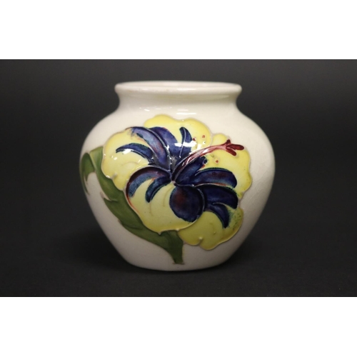 50 - Vintage Moorcroft pottery squat vase of white ground, with red and yellow Hibiscus, Walter Moorcroft... 