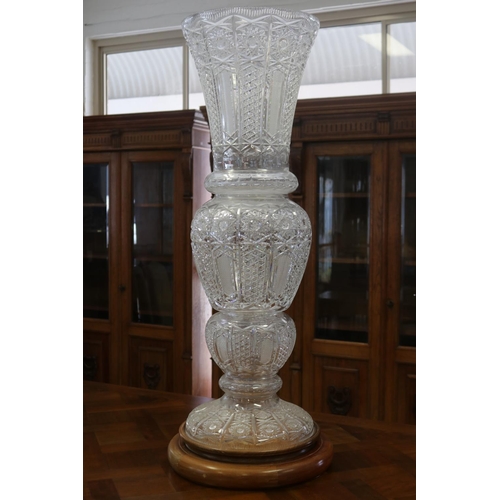 102 - Most impressive large vintage German monumental three piece cut crystal vase, standing on wooden bas... 