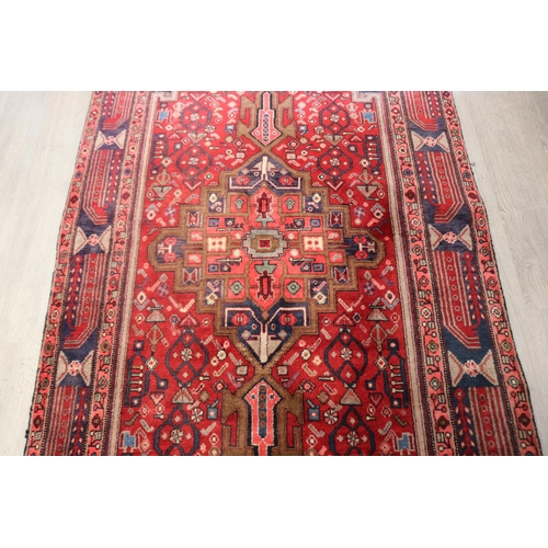 105 - Good Iranian hand knotted wool carpet, approx 319cm x 148cm