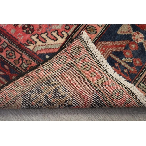 105 - Good Iranian hand knotted wool carpet, approx 319cm x 148cm