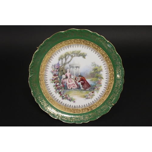 76 - French Limoges porcelain plate of green border with gilt highlights, showing a courting scene to cen... 