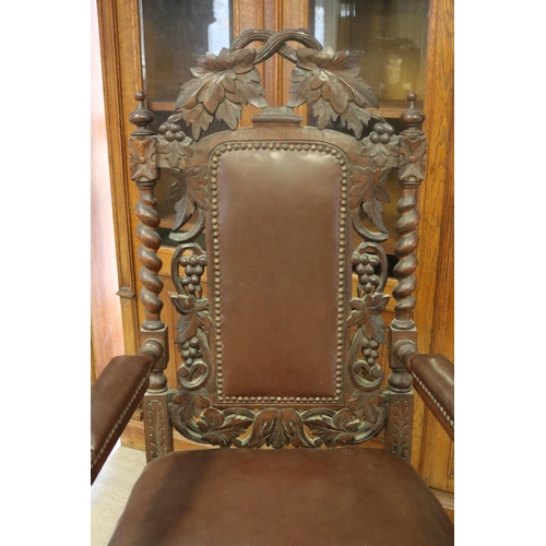 81 - Large Antique Victorian carved oak Jacobean revival arm chair