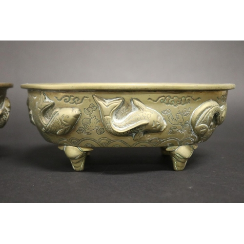 153 - Pair of heavy cast brass jardinieres, decorated with fish motif, approx 8cm H x 21cm L x 15cm D (2)