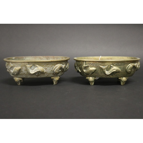 153 - Pair of heavy cast brass jardinieres, decorated with fish motif, approx 8cm H x 21cm L x 15cm D (2)