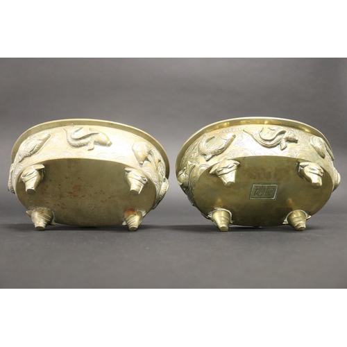 153 - Pair of heavy cast brass jardinieres, decorated with fish motif, approx 8cm H x 21cm L x 15cm D (2)