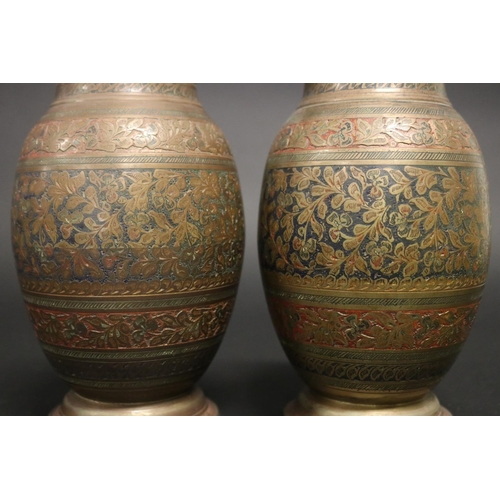 172 - Pair of Middle Eastern vases, with brass & copper work, approx 16cm H (2)