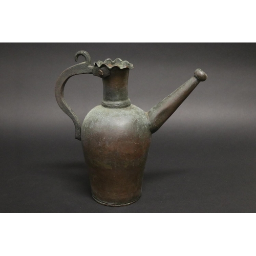 177 - Middle Eastern copper ewer, approx 28cm H x 27cm W