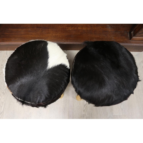 185 - Pair of cow hide four leg stools, each approx 50cm H x 40cm Dia (2)