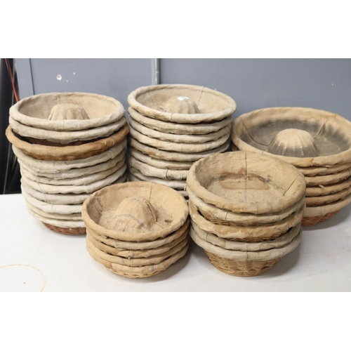 387 - Huge assortment of vintage French circular bread proofing baskets, approx 45cm Dia and smaller (38)