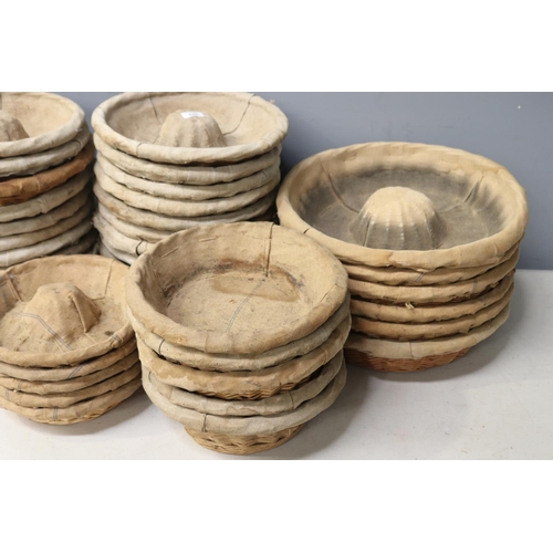 387 - Huge assortment of vintage French circular bread proofing baskets, approx 45cm Dia and smaller (38)