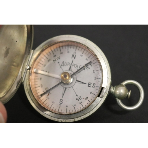 117 - Aurapole nickel plated brass cased compass, number 7826, push button cover, working condition, appro... 