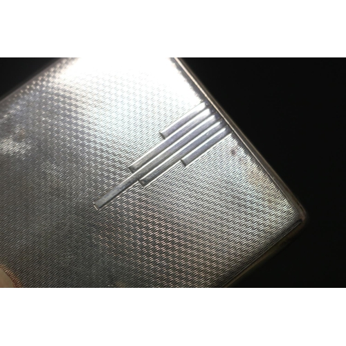 118 - Nude covered sterling silver cigarette case, marked for Birmingham 1936, approx 7cm x 6.5cm