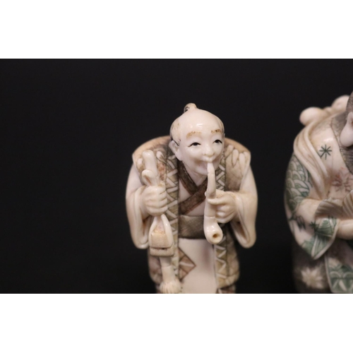 121 - Two well carved Japanese ivory small figures, both signed, approx 6.5cm and 6.2cm H (2)