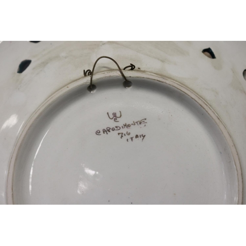 79 - Pair of vintage Capodimonte porcelain hanging plates, each approx 31cm Dia (2)