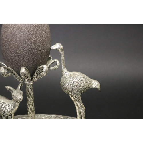 95 - Decorative kangaroo & emu centrepiece with matched emu egg to centre. On patinated bronze base. Appr... 