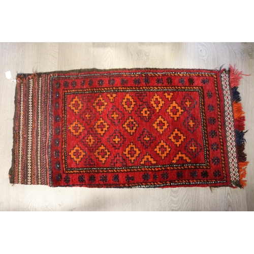 97 - Hand woven wool camel bag carpet, approx 114cm x 61cm