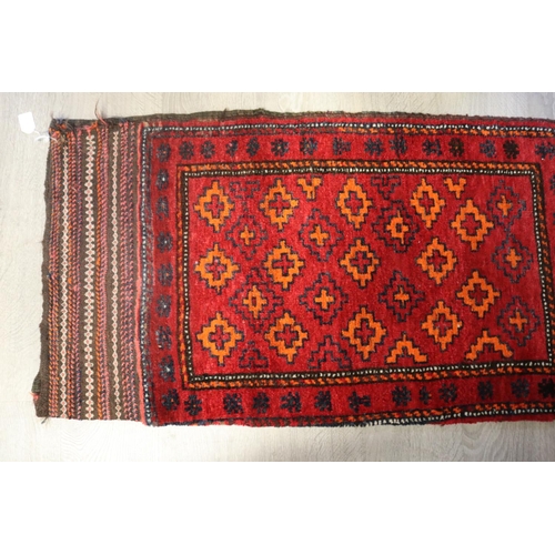 97 - Hand woven wool camel bag carpet, approx 114cm x 61cm