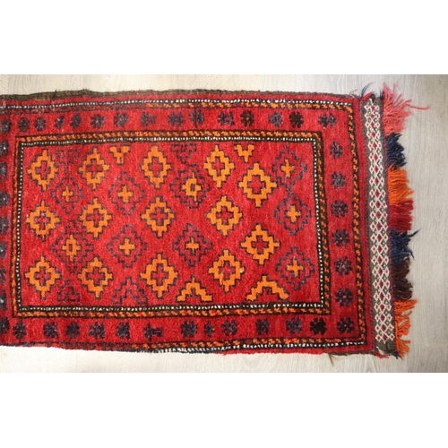 97 - Hand woven wool camel bag carpet, approx 114cm x 61cm