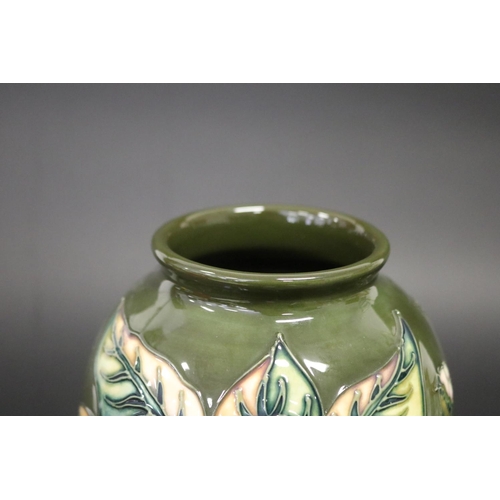 298 - Moorcroft baluster green vase, approx 26.5cm H