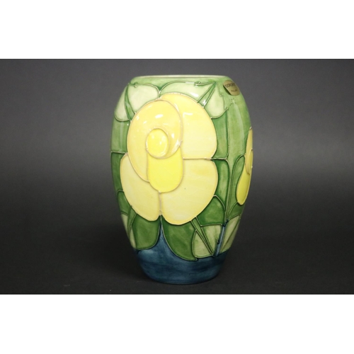 300 - Moorcroft pottery green ground vase, marked to base & paper label, approx 19.5cm H (Af - Cracked)