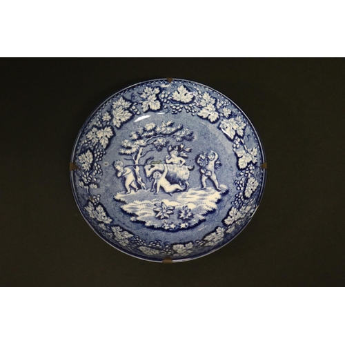 128 - Antique blue & white dish, showing four putti with goat, approx 12cm Dia