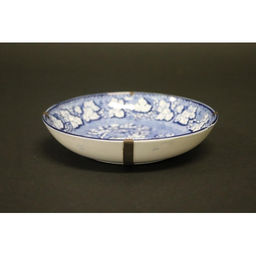 128 - Antique blue & white dish, showing four putti with goat, approx 12cm Dia