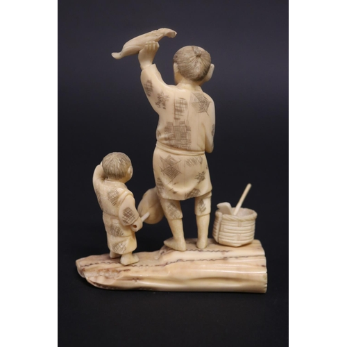 133 - Antique Japanese carved ivory figure group, farmer and boy, signed, approx 14cm H x 11cm W