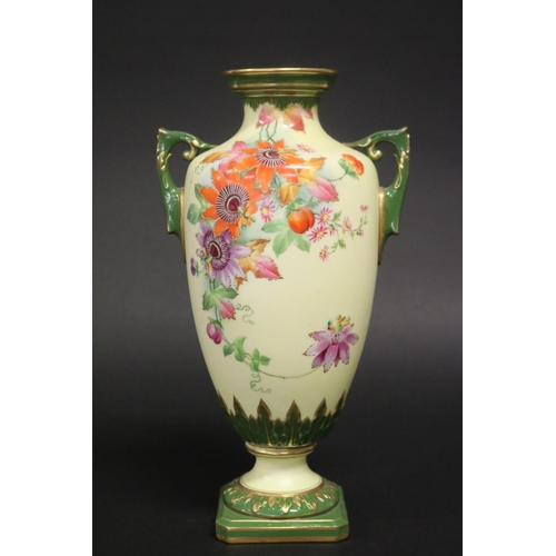 317 - Twin handled pedestal vase, with hand painted floral decoration, marked Worcester to base, 28cm H