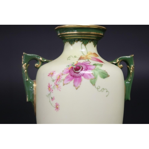 317 - Twin handled pedestal vase, with hand painted floral decoration, marked Worcester to base, 28cm H