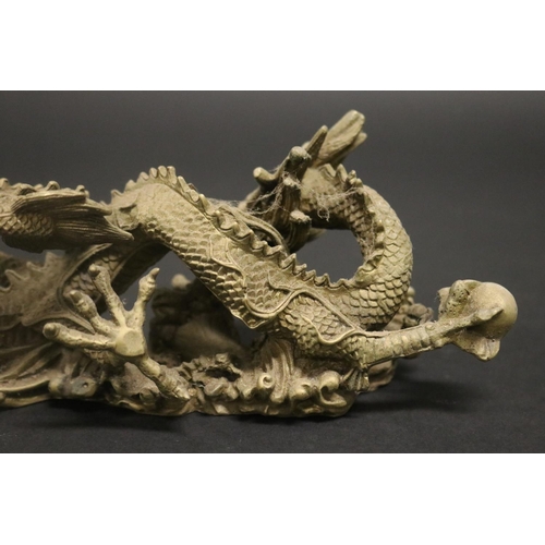 160 - Cast brass figure of a Dragon, heavy, approx 8cm H x 23cm L