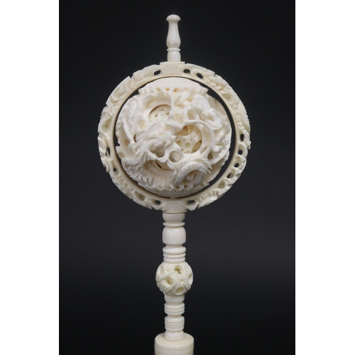 325 - Large Chinese carved ivory puzzle ball, carved with dragons, approx 29cm H