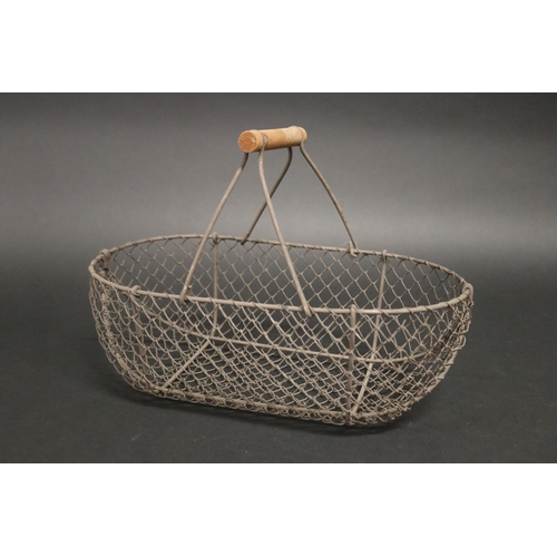 384 - Vintage French wirework egg basket, with wooden handle, approx 24cm H including handle x 35cm W x 19... 