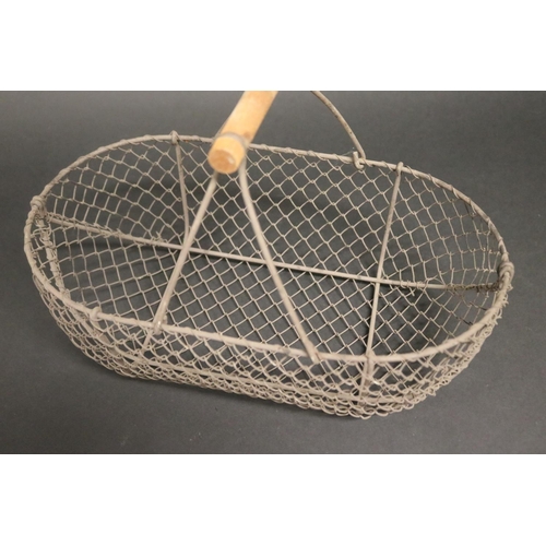 384 - Vintage French wirework egg basket, with wooden handle, approx 24cm H including handle x 35cm W x 19... 