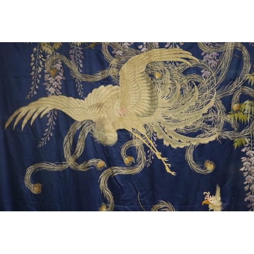 274 - Very rare large blue ground silk wall hanging decorated with two phoenixes & wisteria on silk satin ... 