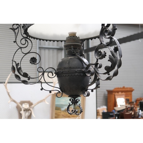 433 - Dutch colonial style black painted metal banquet lamp, with height adjustable weight, central milk g... 