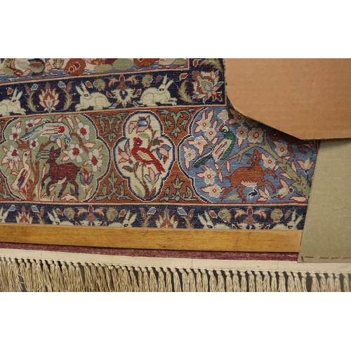 427 - Fine Persian silk Qum wild animal carpet, Ex Persian Carlet Gallery 1979. approx 107cm x 170cm