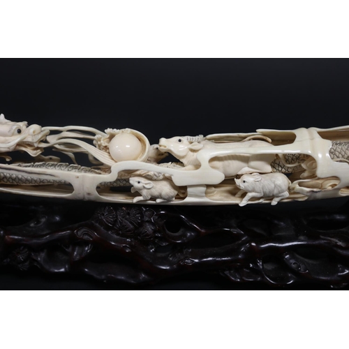 308 - Rare finely carved ancient mammoth ivory tusk section, later carved with the twelve zodiac animals. ... 