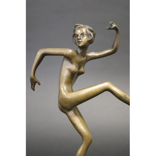 324 - Art Deco style bronze figure of a dancer on square onyx base, approx 33cm H (Af to fingers)