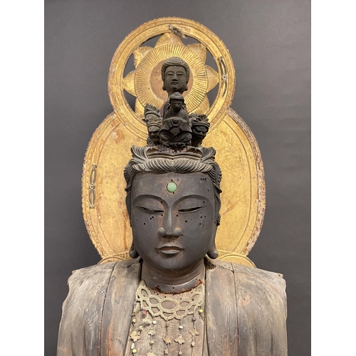 Rare Japanese Carved wood Buddha dating to the Kamakura and Nanbokucho Periods (1185–1392) period. Carved Jade eye of wisdom. Gilt ornate jewellery with coloured glass beads. approx 120cm H