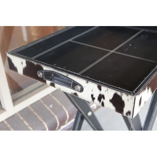 187 - Cow hide X frame tray table, approx 81cm H x 64cm W excluding handles x 47cm D