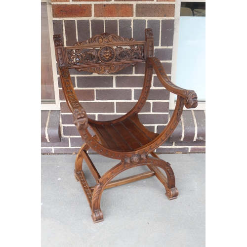 189 - Antique French Renaissance revival carved walnut X frame chair