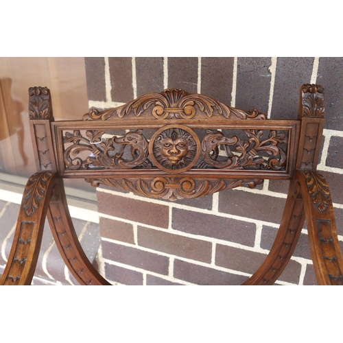 189 - Antique French Renaissance revival carved walnut X frame chair