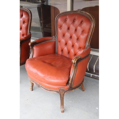 193 - Pair of French Louis XV style leather armchairs with deep buttoned backs (2)