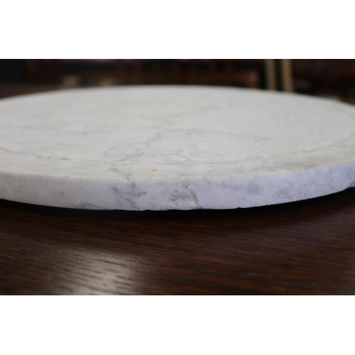 289 - Circular white marble revolving table plateau, approx 48cm Dia